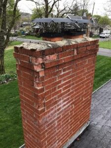 Before chimney restoration and new caps