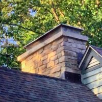 A chimney on a roof.
