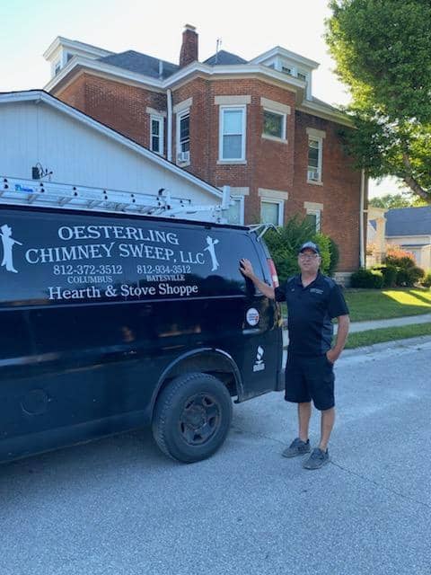 Owner, Matt standing by the Oesterling Chimney Sweep Van